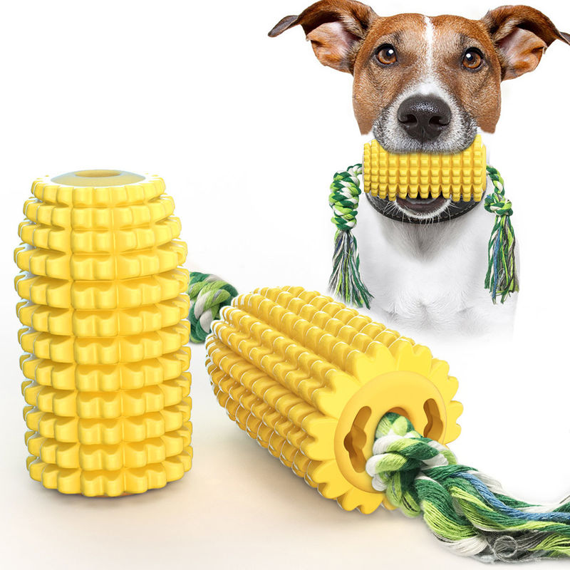 A preparação resistente do animal de estimação da mordida utiliza ferramentas o molar de borracha natural da forma do milho da vara da mastigação do cão