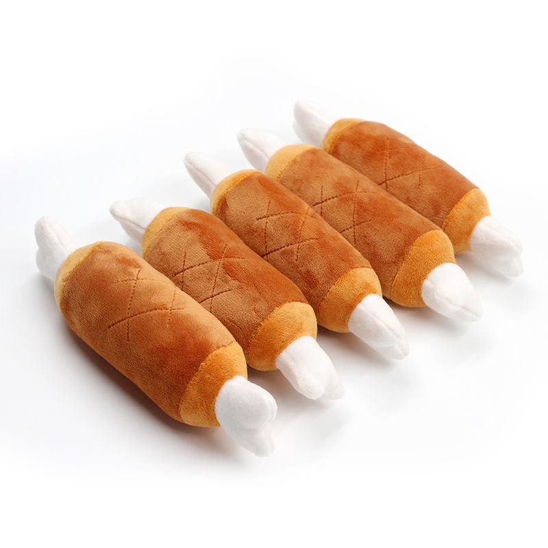 A mastigação sibilante dirigida dois do cão do luxuoso da forma do osso brinca o cachorrinho que sai os dentes os brinquedos 27g